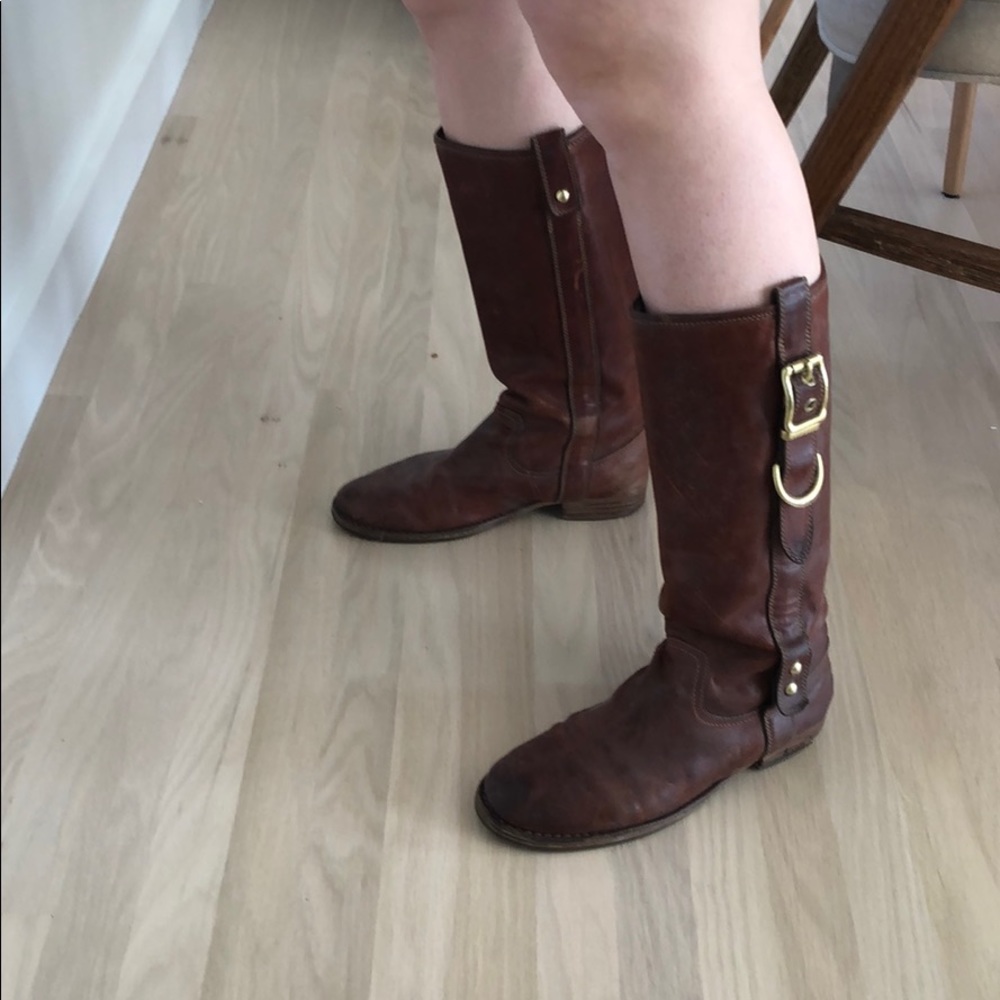 Worn in brown coach boots